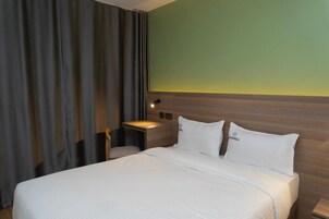 Premium bedding, down comforters, pillowtop beds, desk