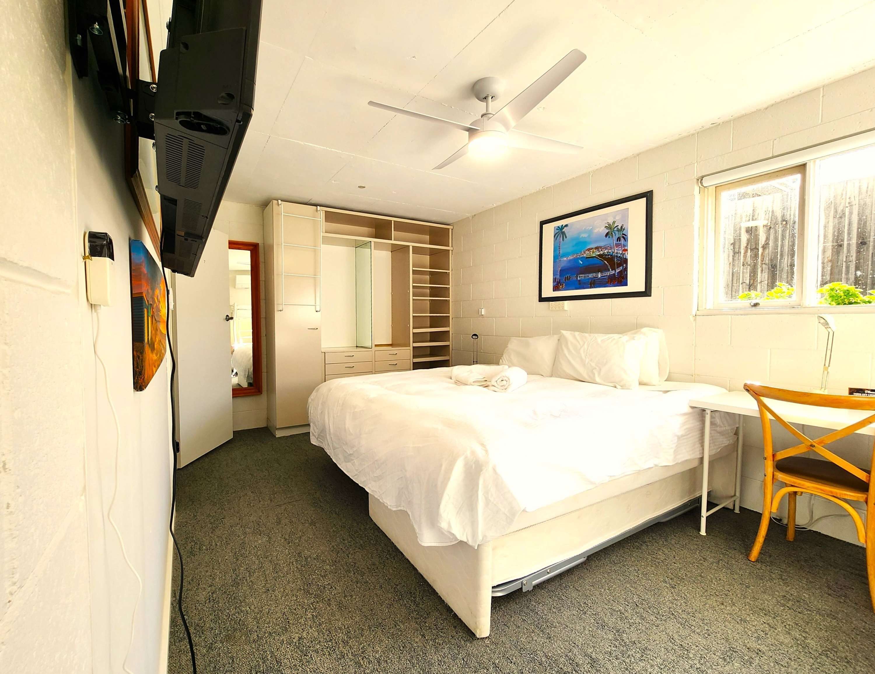 1 bedroom, desk, iron/ironing board, travel crib