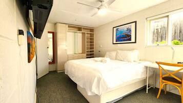 1 bedroom, desk, iron/ironing board, travel crib