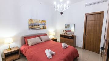 Apartment, 3 Bedrooms, Balcony, City View | Blackout drapes, iron/ironing board, free WiFi