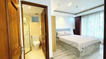 Suite Grand, 2 habitaciones, Acceso al salón del club, vistas a la ciudad | Sábanas de algodón egipcio y ropa de cama de alta calidad