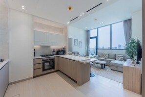 Fridge, microwave, oven, stovetop - Modern 1 Bed l Private Pool l Community Views (Jumeirah Village Circle)