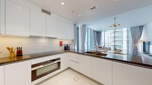 Fridge, microwave, oven, stovetop - Serene 3 Bed Haven l Private Beach l District One (District One)