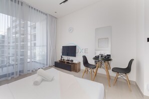 In-room safe, iron/ironing board, free WiFi, bed sheets - High-Floor Studio Overlooking the Community, Short Drive to Miracle Garden (Dubai)