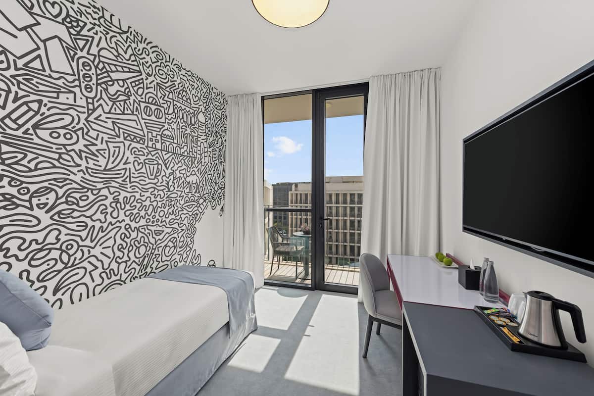 Solo with Balcony | In-room safe, desk, laptop workspace, iron/ironing board