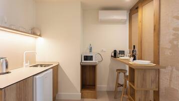 Superior vierpersoonskamer | Een kluis op de kamer, gratis wifi