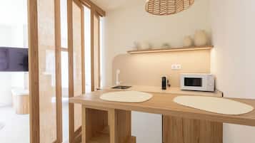 Habitación cuádruple estándar, patio | Caja fuerte y wifi gratis