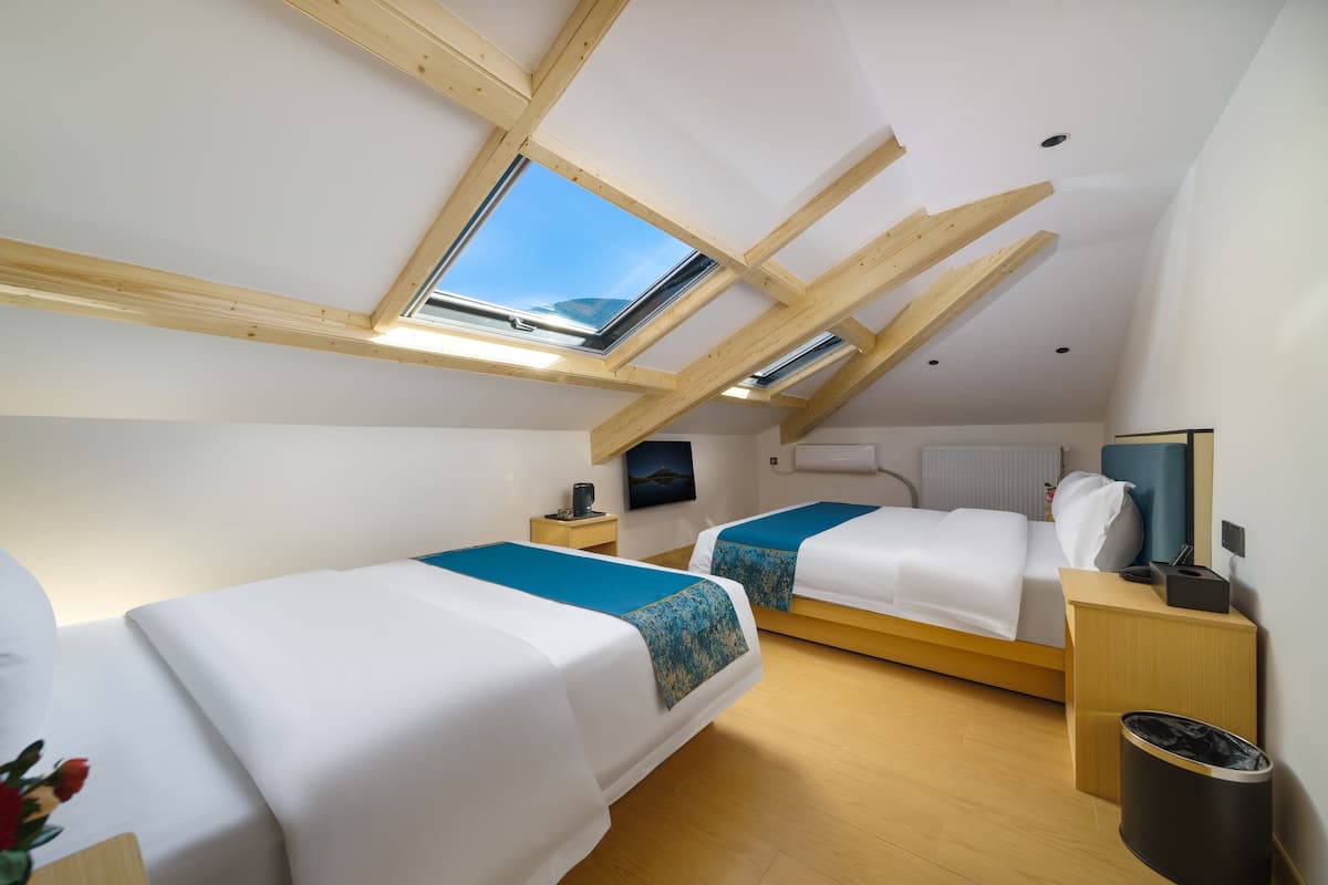 Premium bedding, down duvets, individually decorated