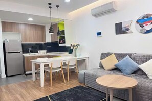 Grand Suite, 1 Bedroom, Club Lounge Access, City View | Egyptian cotton sheets, premium bedding, down comforters - Odela Luxstay Republic Saigon Airport (Tan Son Nhat)