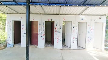 Shower, towels, shampoo, toilet paper