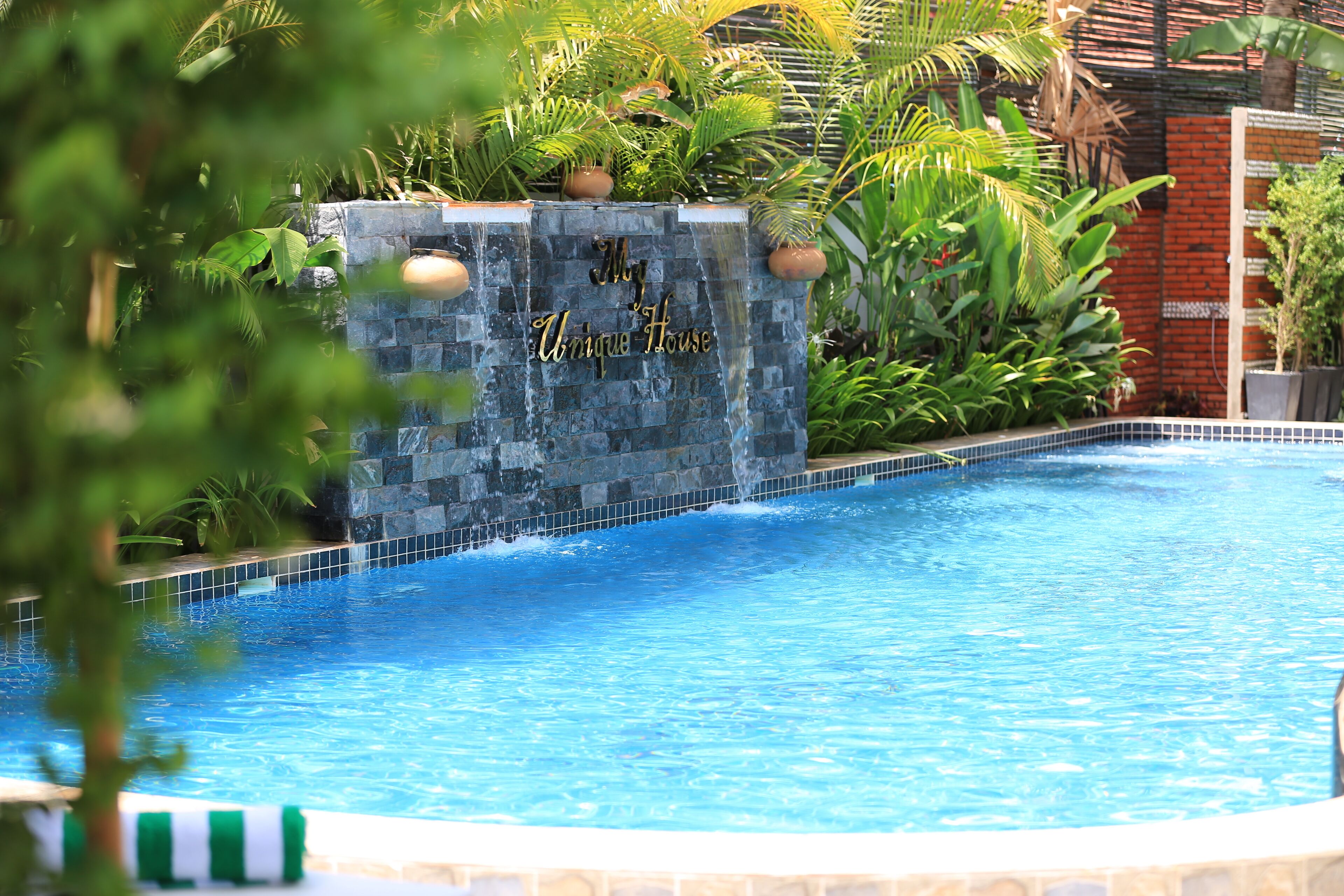 Indoor pool, open 8:00 AM to 9:00 PM, pool umbrellas