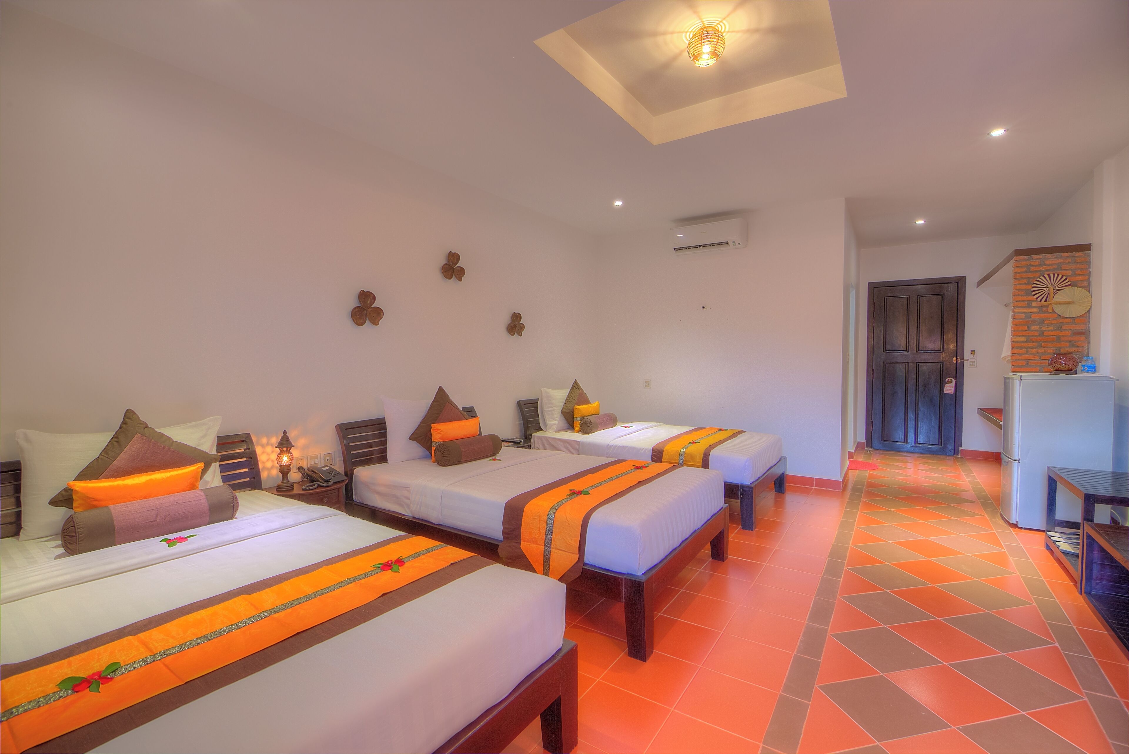 Deluxe Triple Room, Balcony, Garden View | Premium bedding, minibar, desk, bed sheets