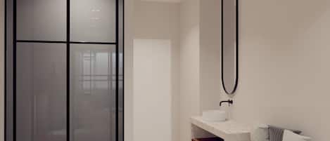 Een douche, een haardroger, handdoeken, zeep