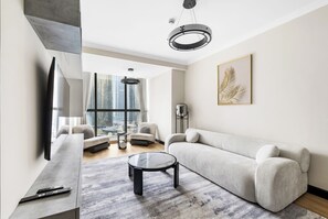 Living area - 1BR by the Lake Near DMCC Metro Station (Dubai)