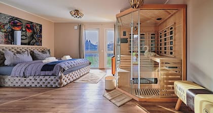 Luxury suite with infrared sauna, electric fireplace & panoramic abbey view