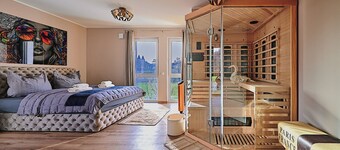 Luxury suite with infrared sauna, electric fireplace & panoramic abbey view