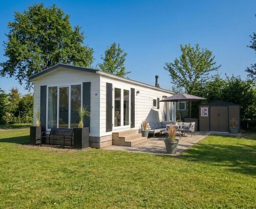 Spacious Chalet near beach and harbor on 5-star park De Kuilart on the Frisian Lakes