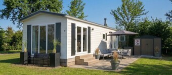 Spacious Chalet near beach and harbor on 5-star park De Kuilart on the Frisian Lakes