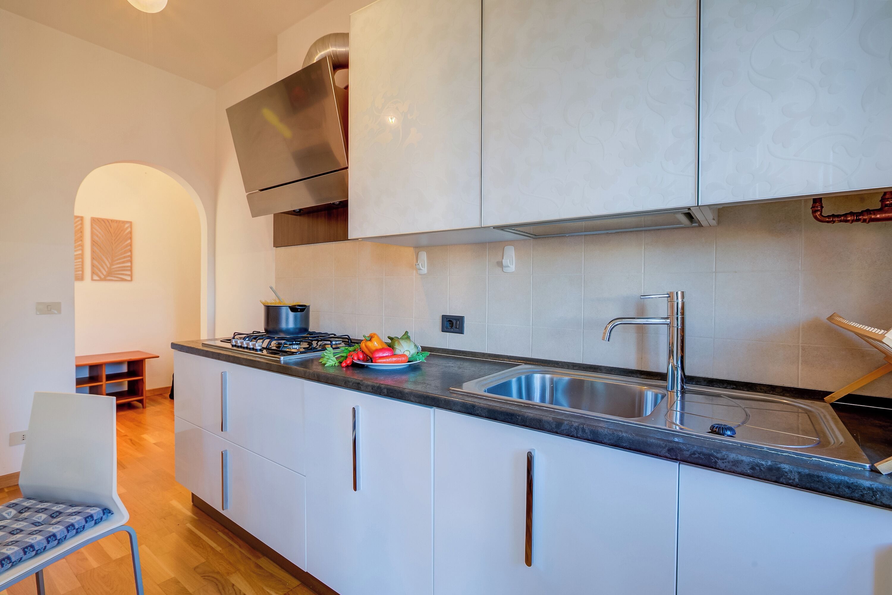 Appartement Familial, plusieurs chambres, en bord de plage (Dolce Orizzonte Few Steps From Lake) | Cuisine privée