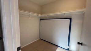 A room with a large window, a door, and a white wall. - 4BrHome • MountainViews • SolarSetup: EverydayStay (Twentynine Palms)