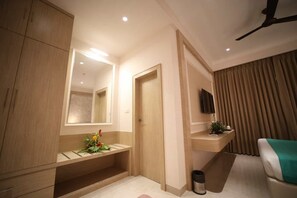 Comfort Room | In-room safe, desk, laptop workspace, iron/ironing board - Sanrose Retreat By Swarnika Hotels (Ayodhya)