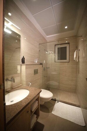 Comfort Room | Bathroom | Free toiletries, hair dryer, slippers, towels - Sanrose Retreat By Swarnika Hotels (Ayodhya)