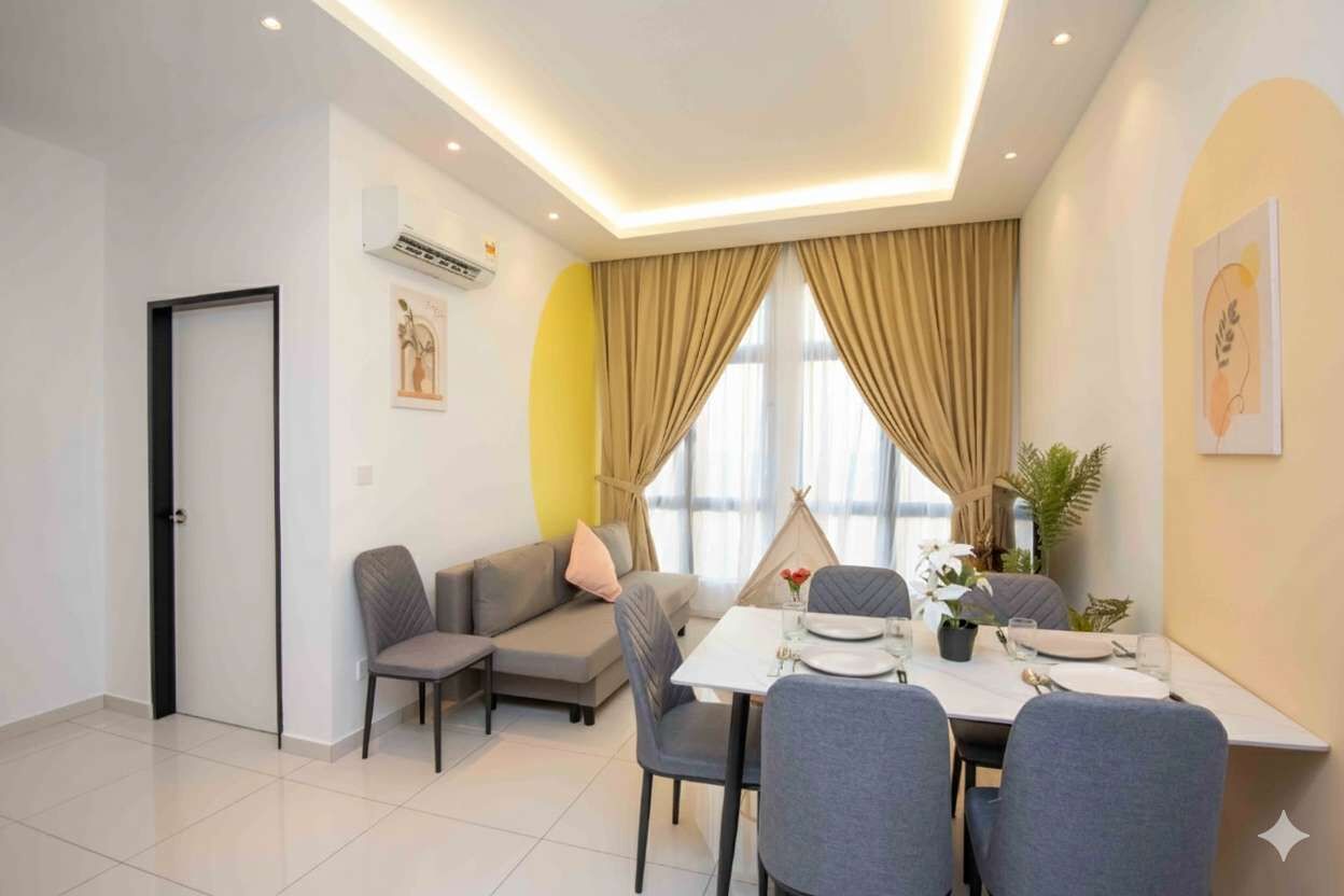 A modern dining area with a table set for four, a sofa, and a tent-like structure.