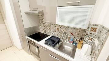 Leilighet – basic | Eget kjøkken | Kjøleskap, ovn, kokeplater og kjøkkenutstyr