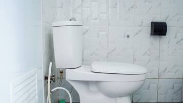 Family Villa, Garden View | Bathroom | Shower, towels, toilet paper