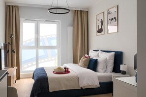 Suite estudio Confort | Tabla de planchar con plancha, wifi gratis, ropa de cama