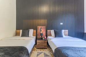 Apartemen, 2 Tempat Tidur Twin, balkon, pemandangan kota | Seprai katun Mesir, seprai premium, dan didekorasi berbeda-beda