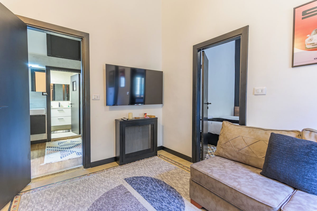 Apartment, 2 Single Beds, Balcony, City View | Living room