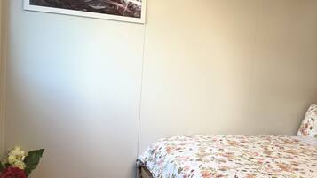 Coffres-forts dans les chambres, fer et planche Ă repasser