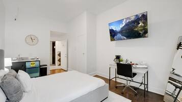 1 dormitorio, tabla de planchar con plancha, Internet y ropa de cama