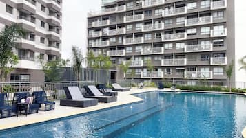 Outdoor pool, pool umbrellas, pool loungers