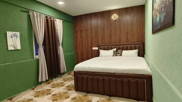 Premium bedding, down comforters, memory foam beds, laptop workspace