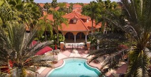 A pool area with a gazebo, surrounded by palm trees and a building with a red roof. - Sol150sv 4bed Solana 4 Bedroom Home (Davenport)