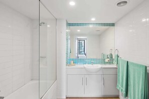 Hair dryer, towels, soap, shampoo