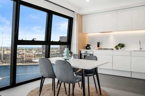 Dining - 2BR Docklands DreamView: Waterfront, Pool & Parking (Docklands)