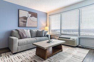Apartment (1 Bedroom) | Living area | 50-inch Smart TV with digital channels