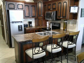 Fridge, microwave, oven, stovetop - Palacio Del Mar 203 - Rocky Point Oceanfront Vacation Rental (Puerto Peñasco)