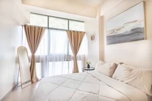1 bedroom, desk, WiFi, bed sheets - Mactan Newtown Ocean Vista (Lapu-Lapu)