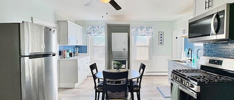 Coffee/tea maker, fridge, microwave, oven
