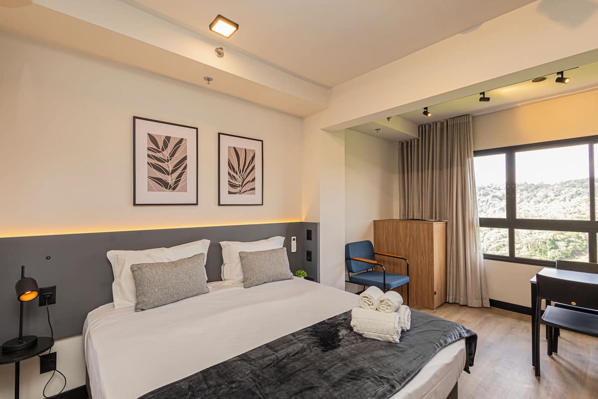 Standard Room, City View | Laptop workspace, WiFi (free), bed sheets