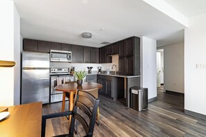 Fridge, dining tables - Landing | Beautiful 1BD, Yoga Studio, Gym (Hartford)