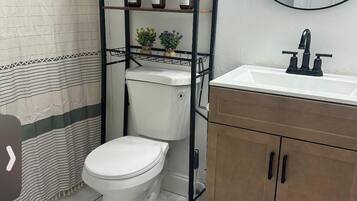 Hair dryer, towels, soap, toilet paper