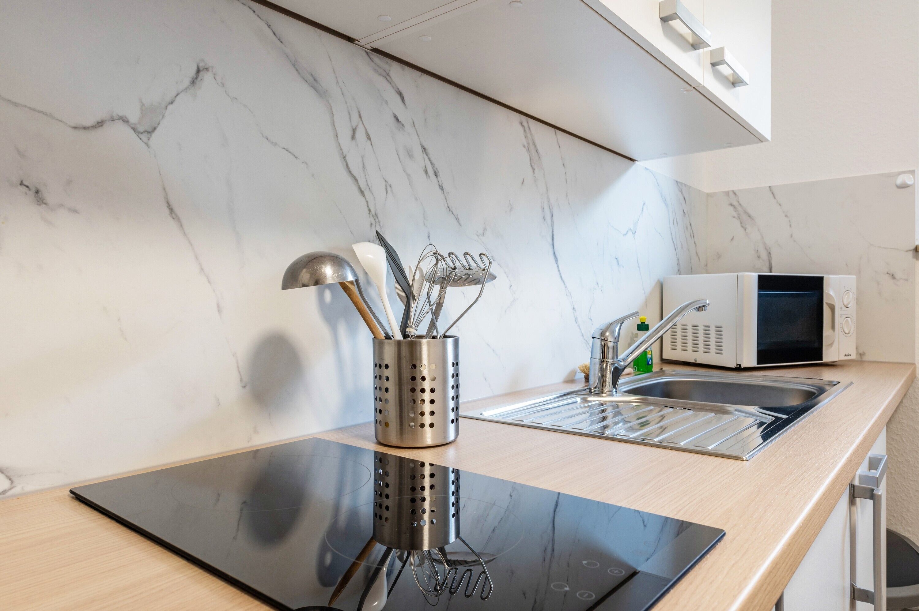 Fridge, microwave, stovetop, coffee/tea maker