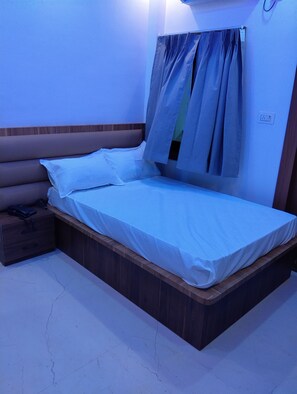 Economy Double Room Single Use, City View | Desk, laptop workspace, soundproofing, iron/ironing board - Hotel 7R Residency (Jhansi)