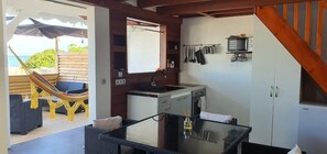 Comfort Apartment | Living area | 32-inch Smart TV with satellite channels - KaZa Bielle by La Manoshra (Capesterre-de-Marie-Galante)