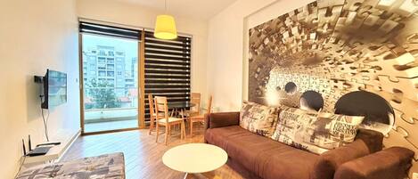 Appartamento Superior, balcone, vista città | Area soggiorno